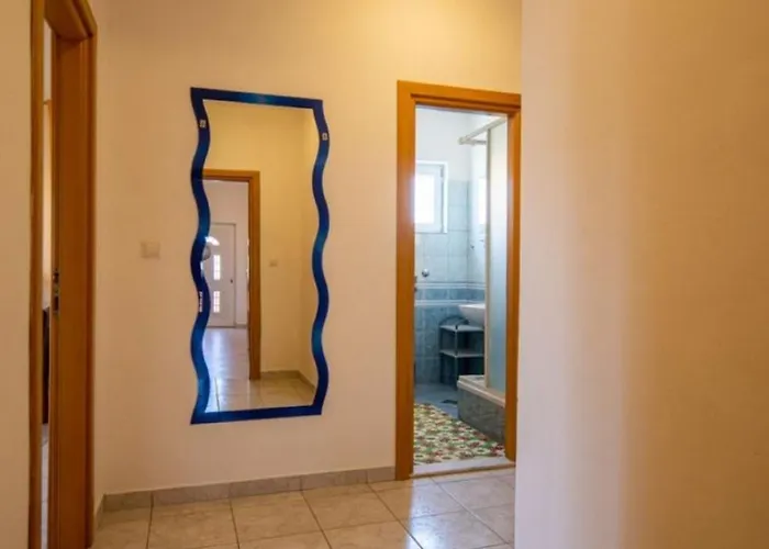 Den Διαμέρισμα