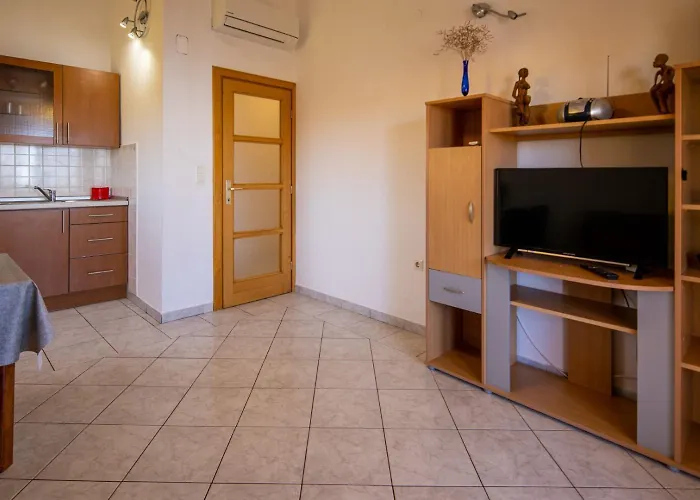 Den Διαμέρισμα *